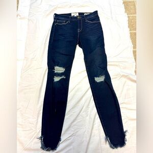 Frame size 26 waist dark jeans distressed with cool design on the bottom
